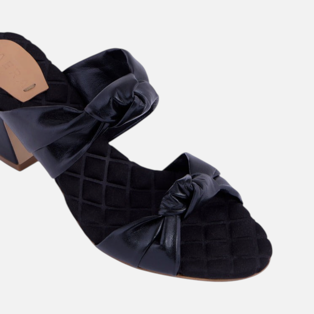 AERA ALESSIA black nappa-effect block heel mule, close-up of the knotted straps and quilted footbed.