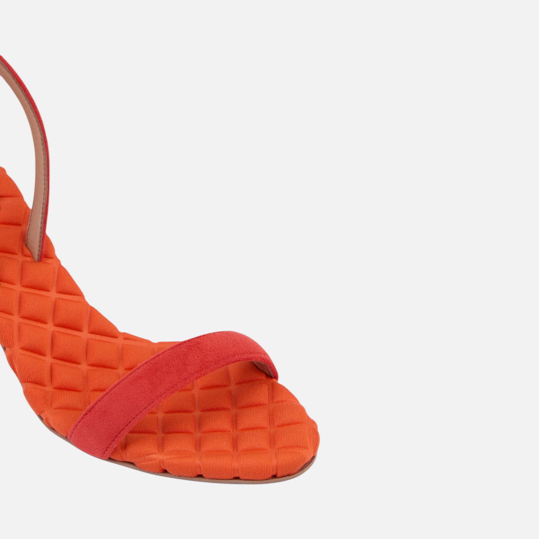 AERA CLAUDIA orange suede-effect slingback sandal, close-up of the front strap and quilted footbed.