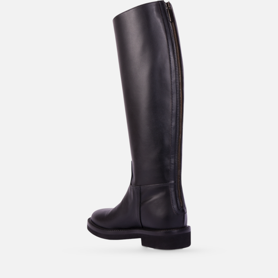 AERA ADA black nappa-effect knee-high boot, rear three-quarter view showing the back zipper and low heel.