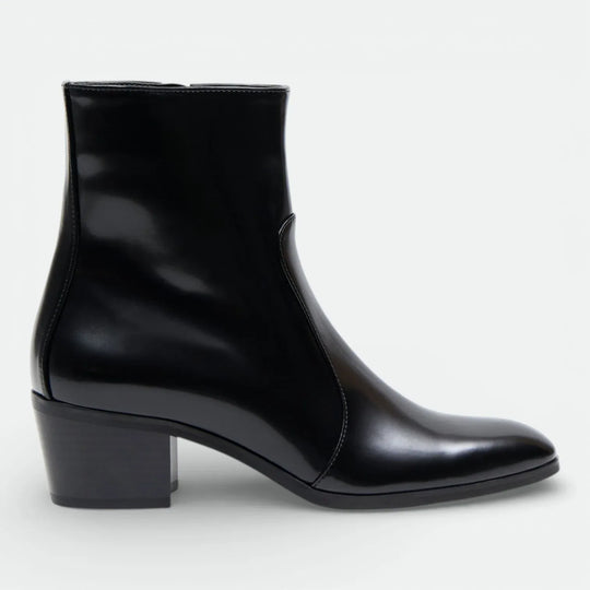 Black leather ankle boot with block heel and sleek minimalist design, side view