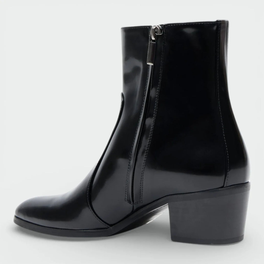 Black leather ankle boot with side zipper and block heel, fashion footwear on white background