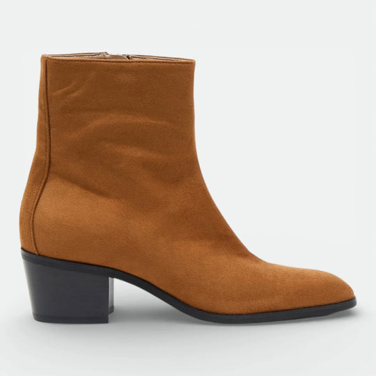 Tan suede ankle boot with block heel and rounded toe on white background