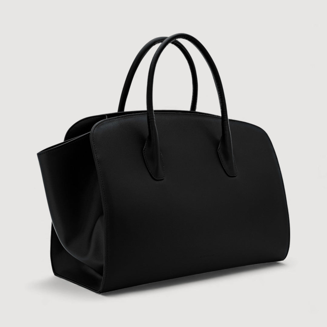 ALEXANDRA K. VEGAN HANDBAGS Gigi | Maxi Tote Bag | Black from ALLTRUEIST, featuring a minimalist design and supple corn leather.