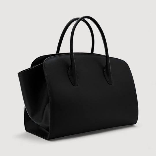 ALEXANDRA K. VEGAN HANDBAGS Gigi | Maxi Tote Bag | Black from ALLTRUEIST, featuring a minimalist design and supple corn leather.